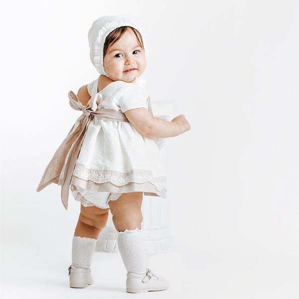 Baby girls Celebration Linen Dress in Beige and Ivory with Bow (6mths-18mths) Baby girls Celebration Linen Dress in Beige and Ivory with Bow (6mths-18mths)